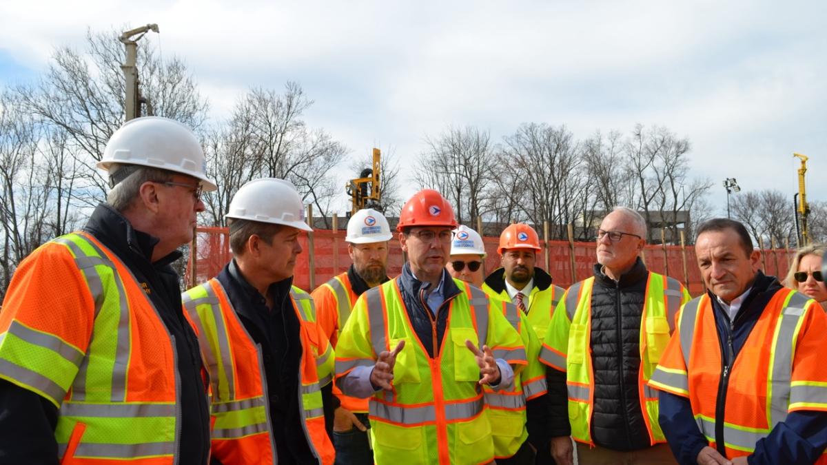 Kean and officials at I-80 Sinkhole Site